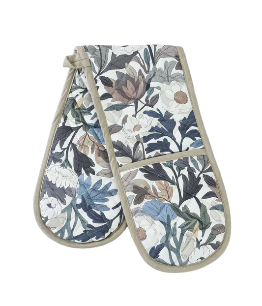 Pair of floral-patterned oven mitts on a white background