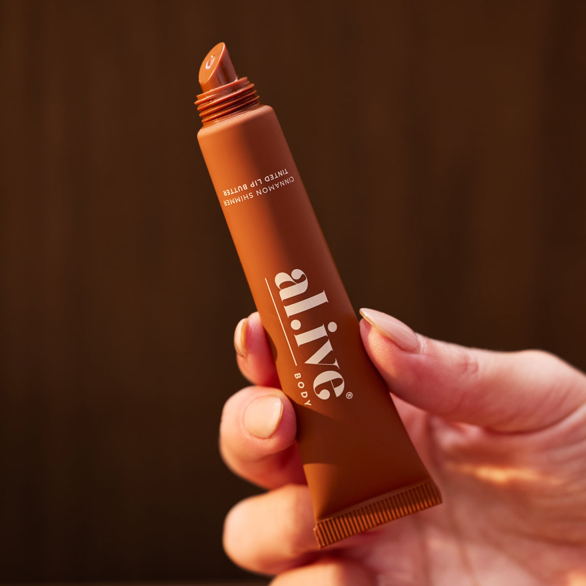 al.ive Body Tinted Lip Butter Ornament - Cinnamon and Citrus