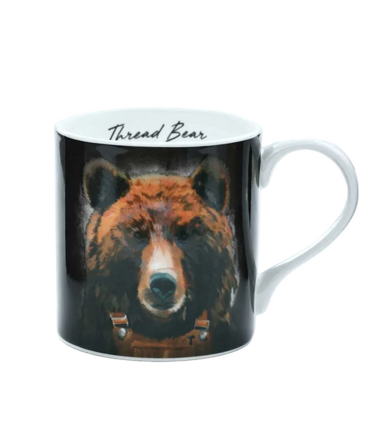 Mug with bear design and 'Thread Bear' branding on a white background