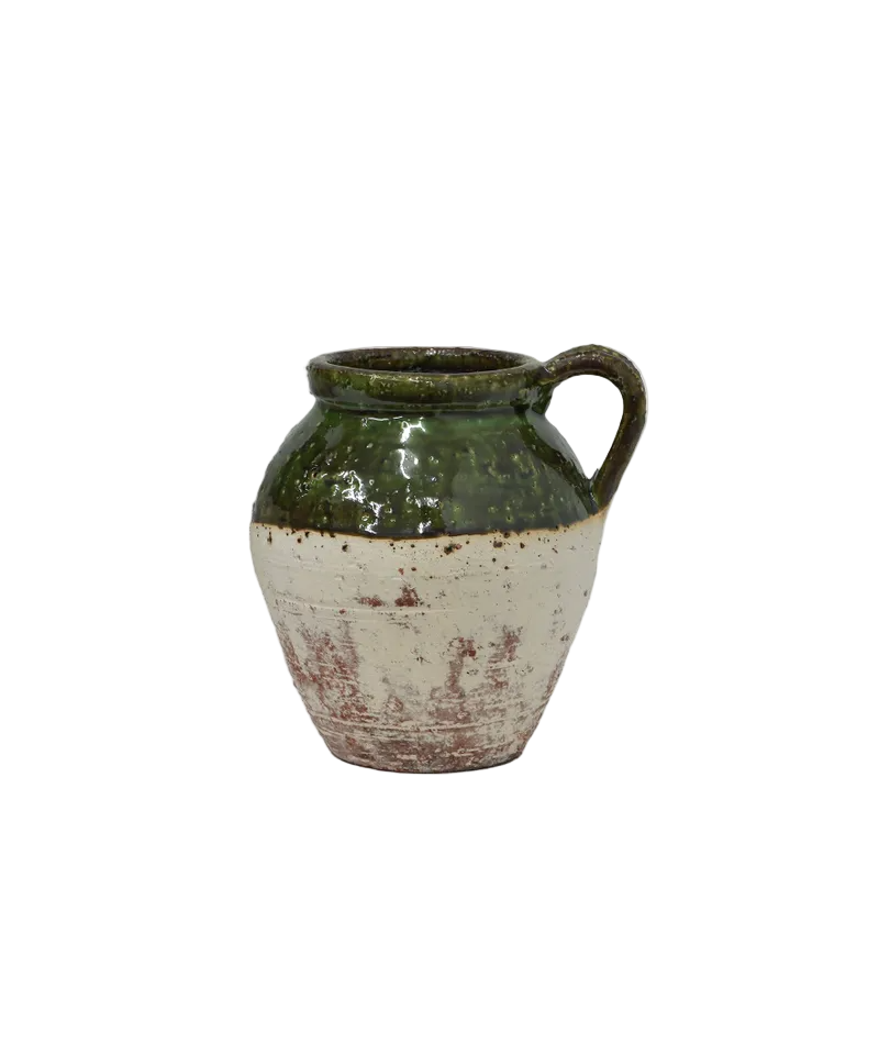 Ceramic vase with green top and white base on a white background