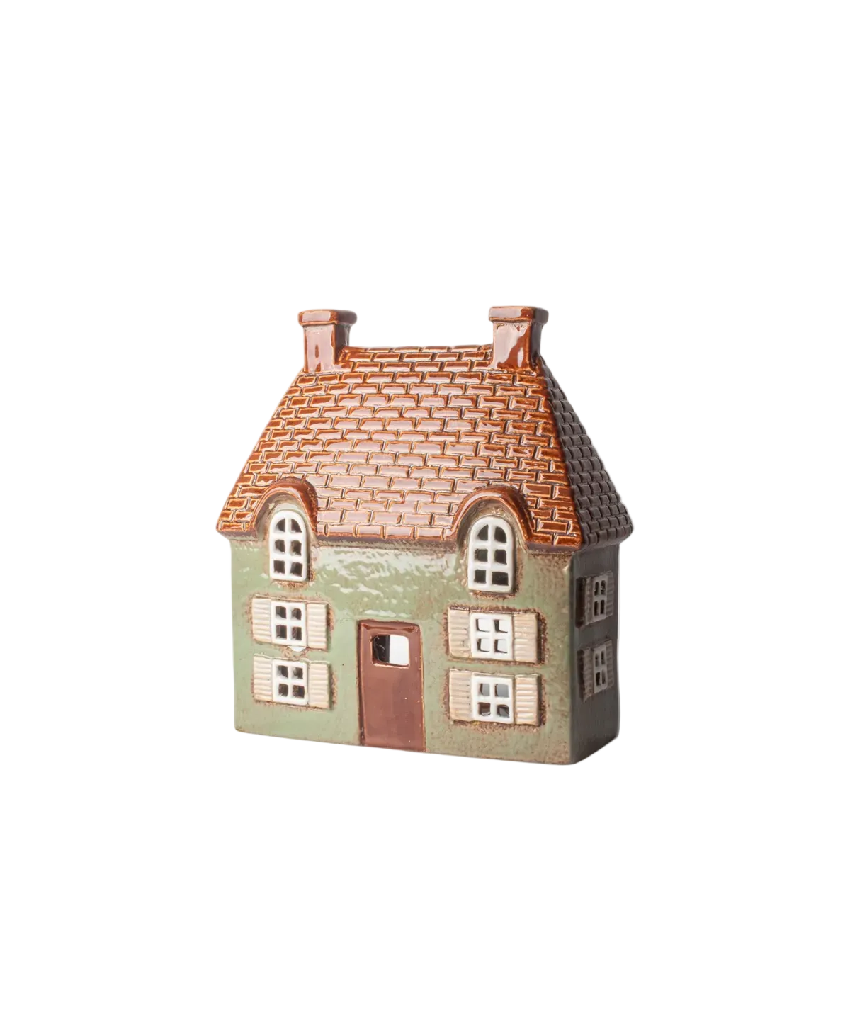Small model of a house with a tiled roof on a white background
